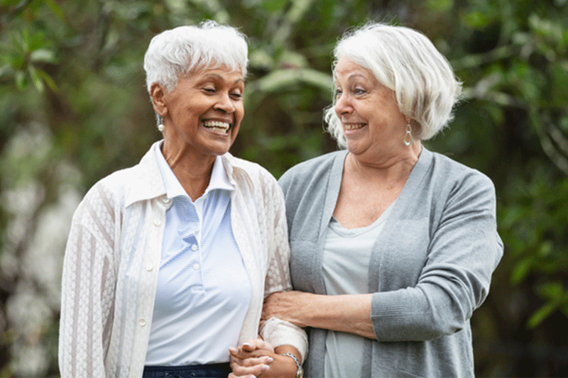 A woman visits a family member with dementia.